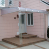 Clear Polycarbonate Patio Awning with Trellises in Elmont